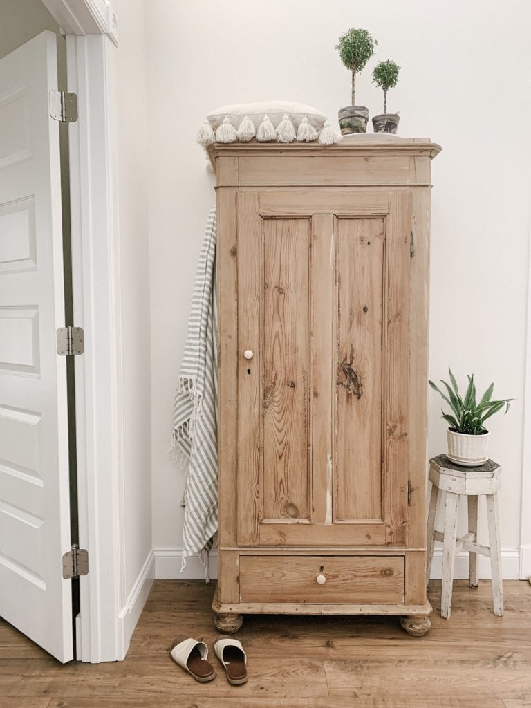 antique pine wardrobe used for storage in home decor