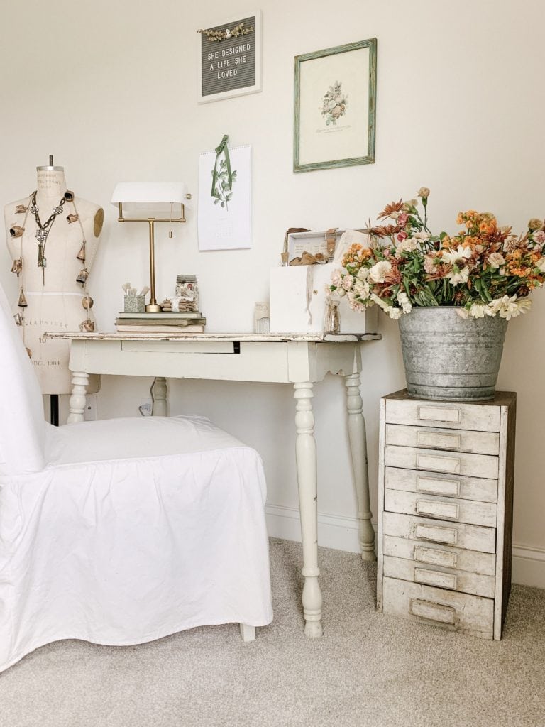 decorated neutral office space with fresh pretty flowers