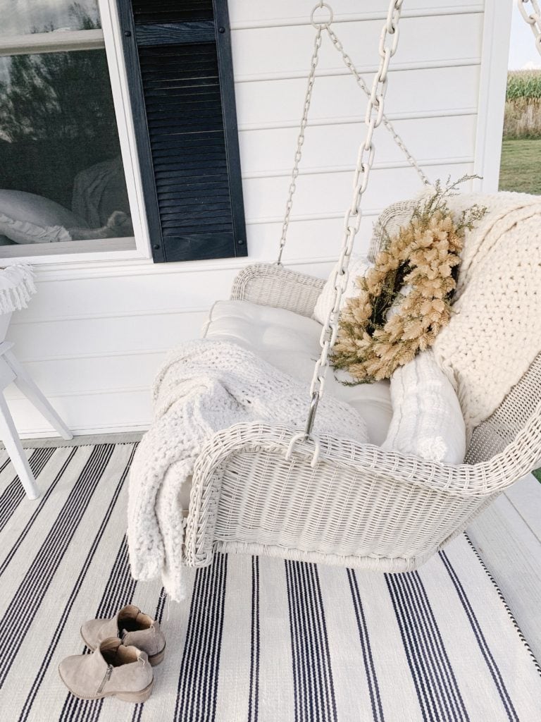 cozy outdoor porch swing with how to make faux wreath look realisitic