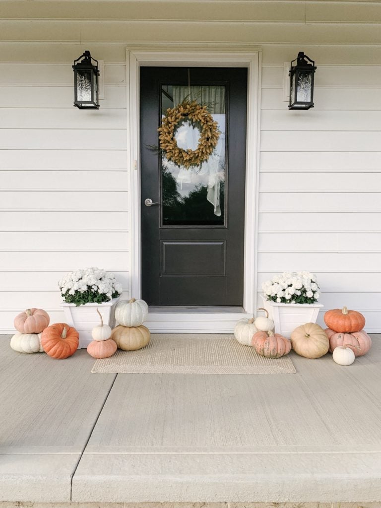 fall front porch goals with mums and pumpkins