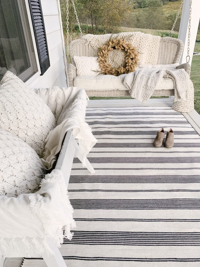 cozy front porch swing space with diy wreath 