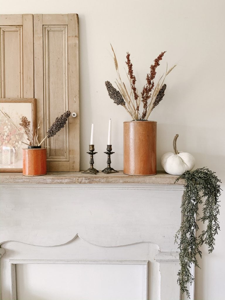 cute autumn mantel decorated using goodwill items