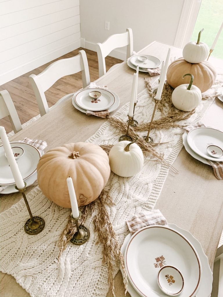 neutral and simple thanksgiving tablescape with cozy knit table runner
