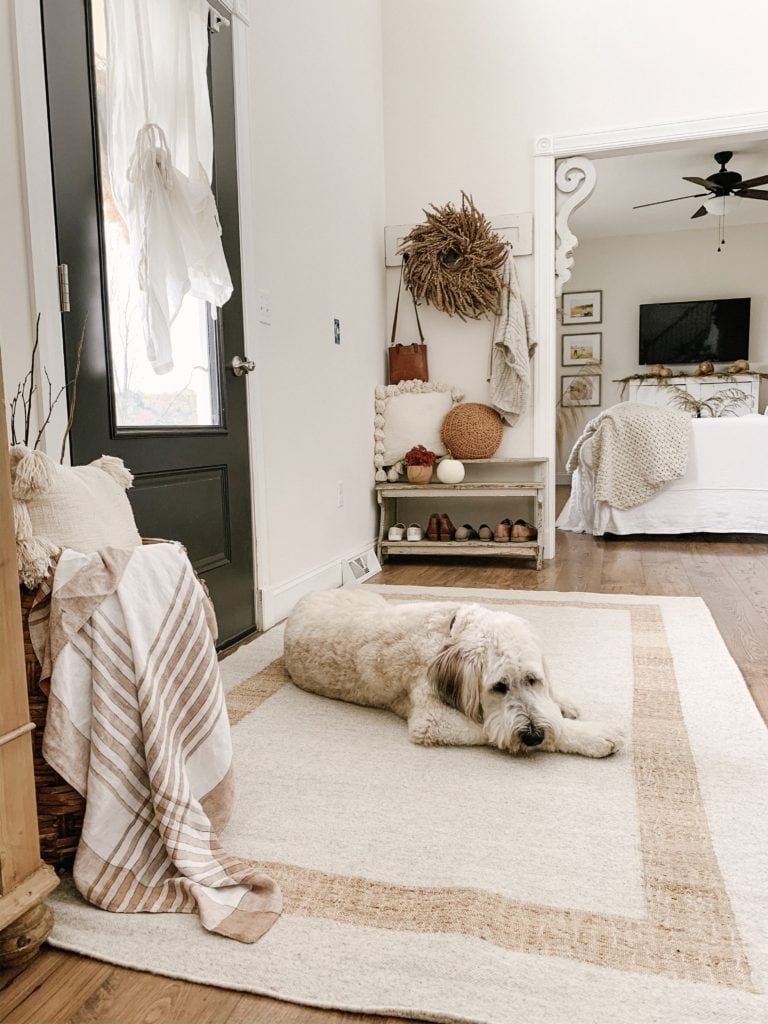 easy fall foyer styled with antiques and cozy textures