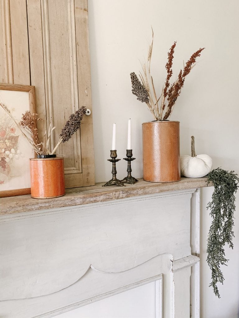 white velvet pumpkin and pair of candlestick holders in fall decor