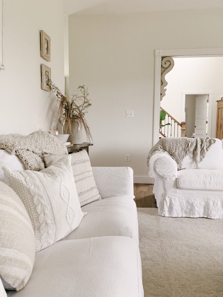 cozy textured pillows on white sofa 
