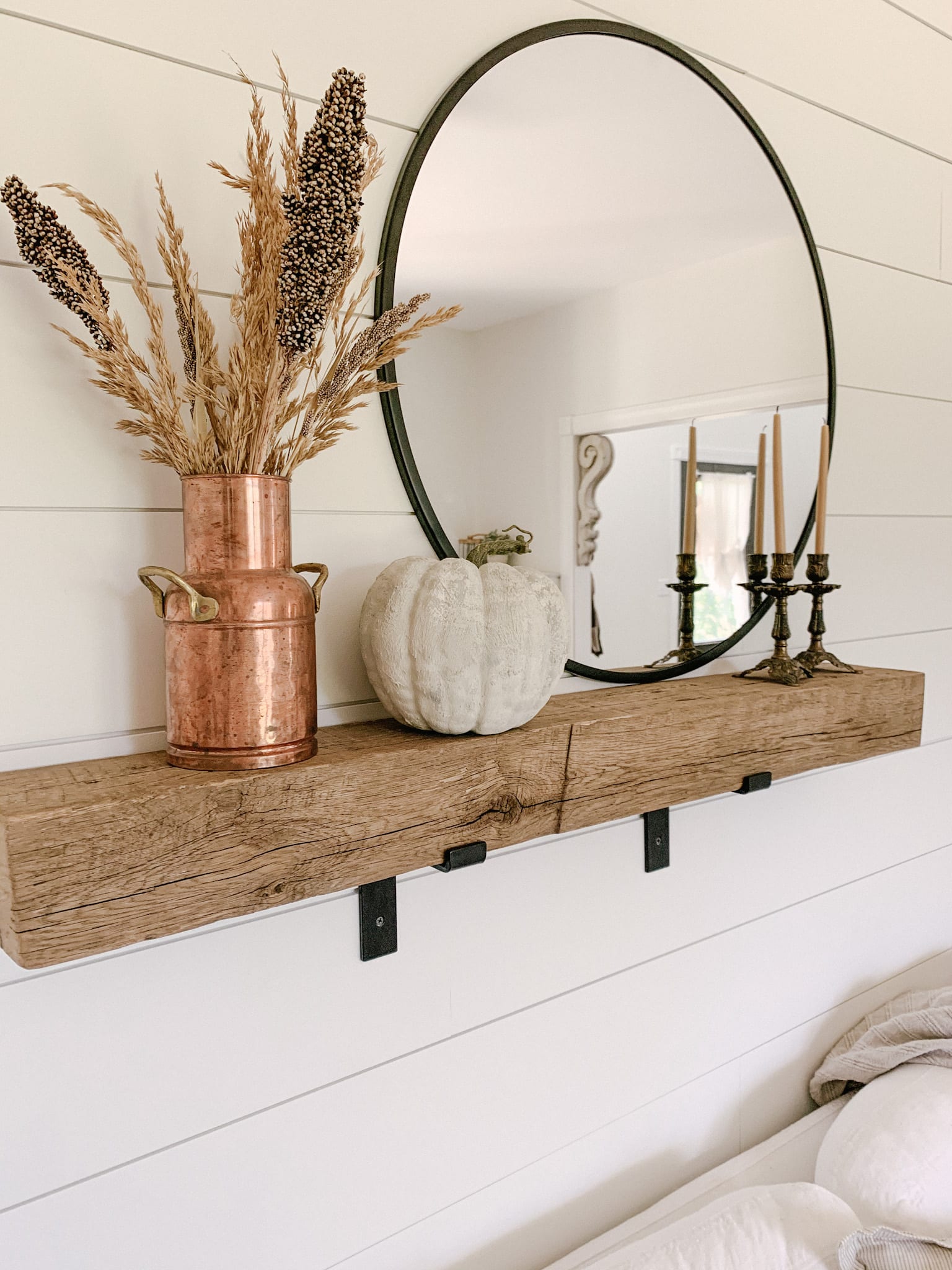simple mantel decor for fall using pumpkin and oats